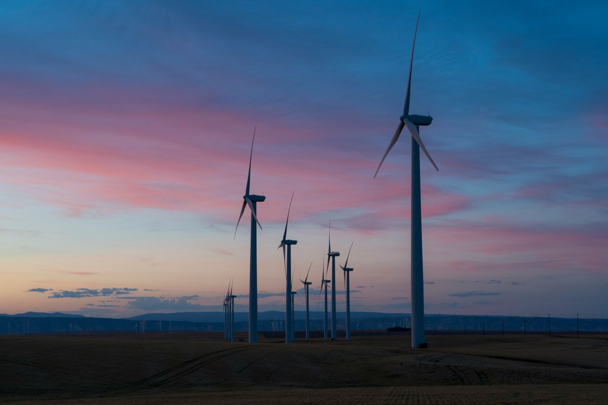Windmills with clear sky in background.