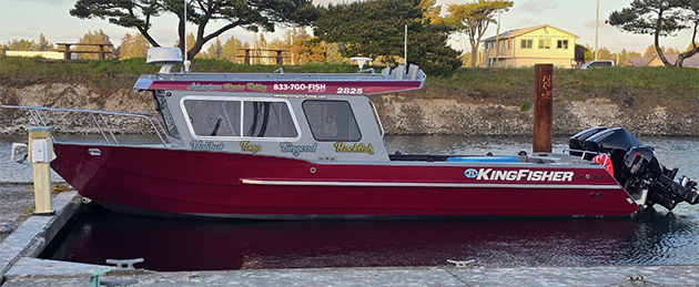 Adventure Charter Fishing boat at dock
