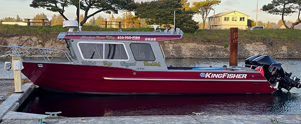 Adventure Charter Fishing boat at dock