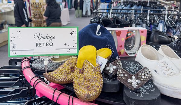 Thrifty Sisters interior and Vintage Retro Sign with sparkly shoes