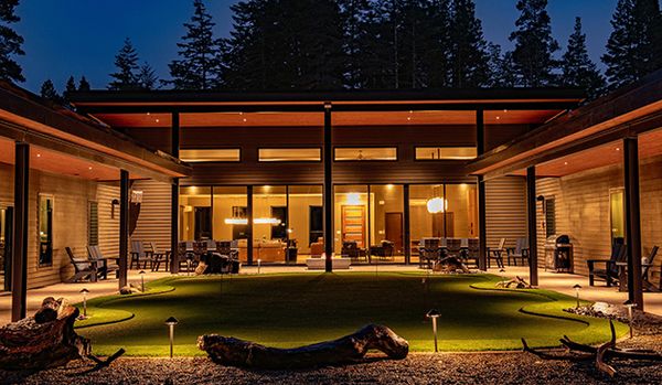Night view of the Shirley Woods Golf House