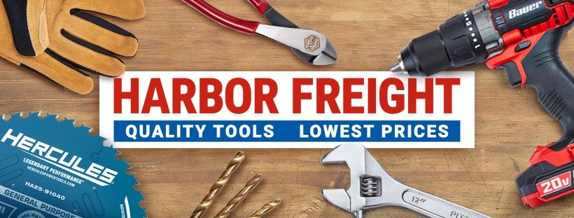 Harbor Freight Logo, saw blade, drill bits, work glove, pliers electric drill and wrench on a wood bench with company name over top