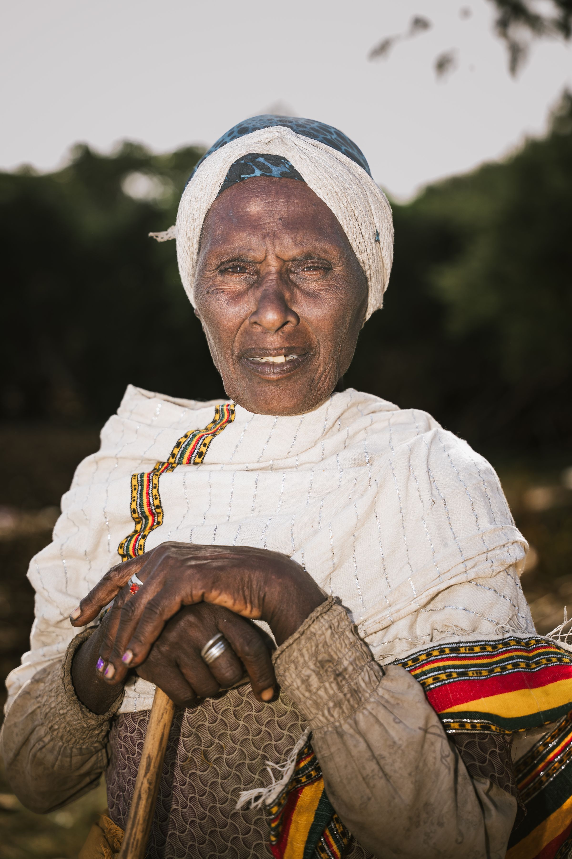 Portrait of an elderly woman in traditional dress in Oromia, Ethiopia
