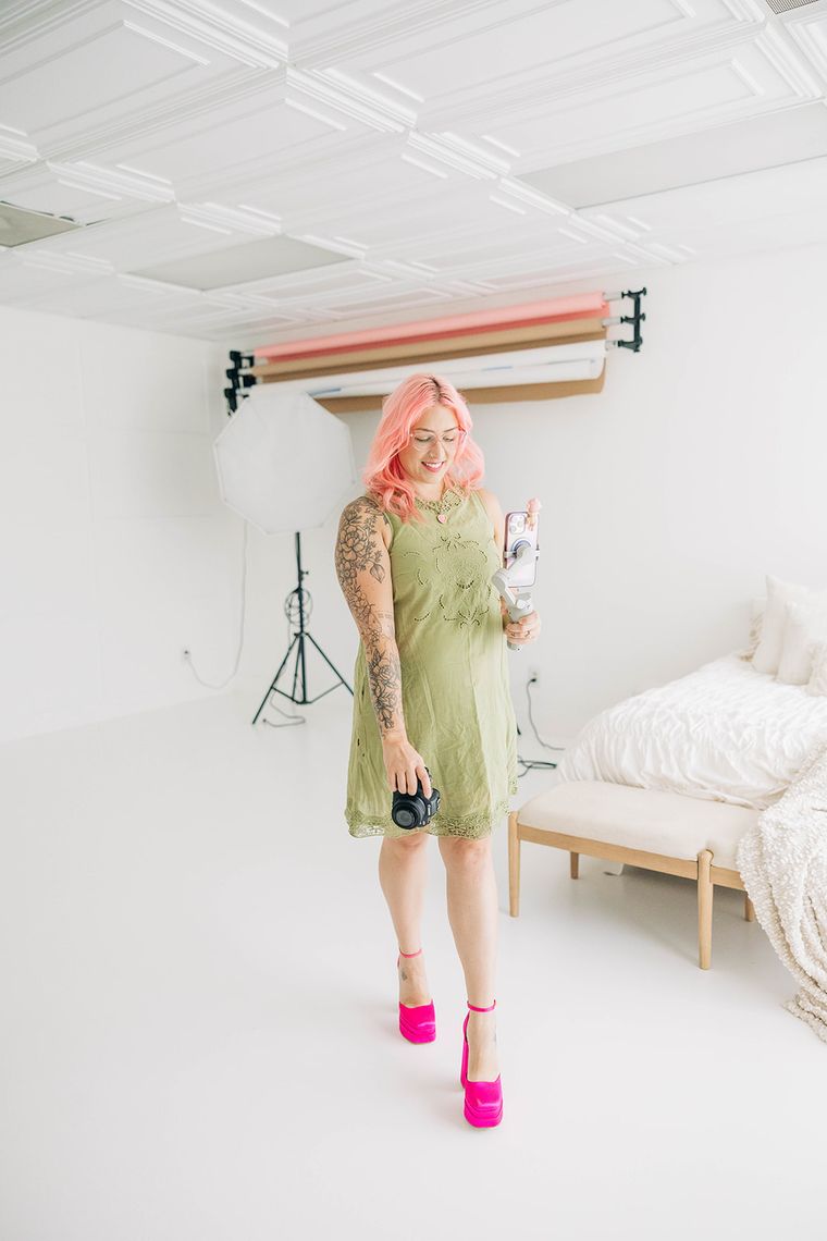 Sydney with her camera in Studio A at SMP Creative Studio
