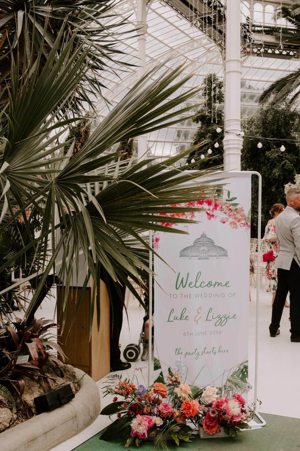 Fabric welcome sign with illustration of Sefton Park Palm House. 