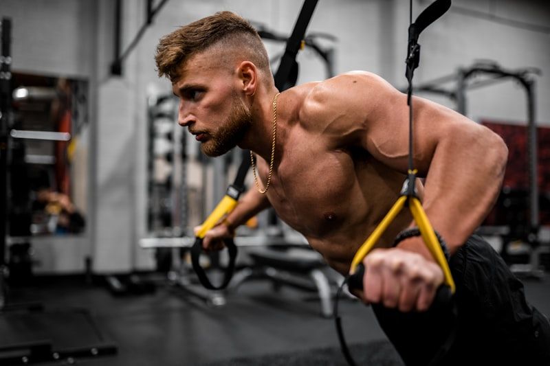 Man looking strong and energised at the gym