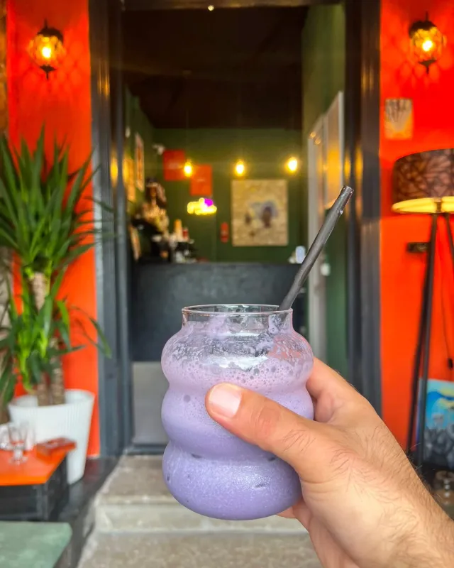 A warm, cozy cafe interior and seasonal smoothy.
