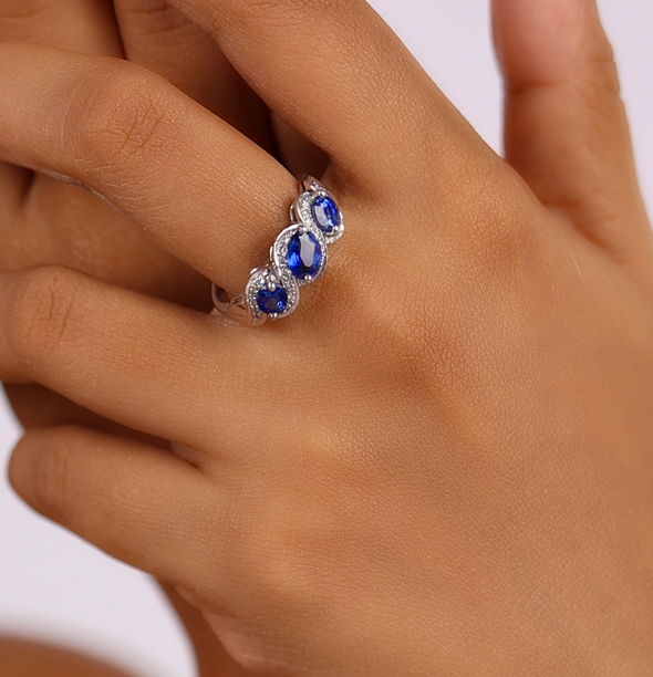 Three-Stone Royal Blue Sapphire Halo Ring - view 1
