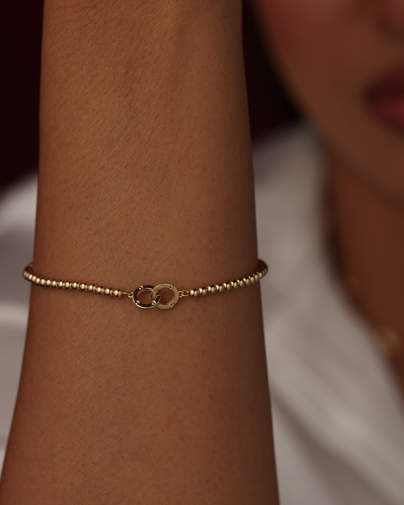 Interlocking Ring Beaded Gold Bracelet