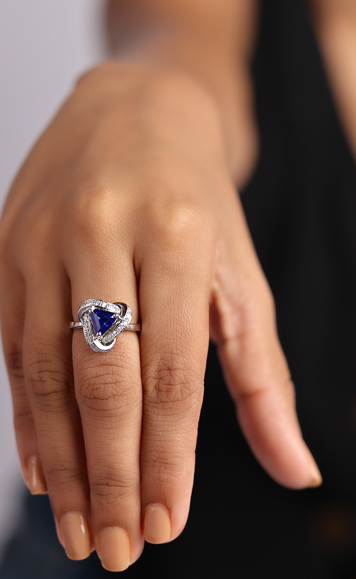 Trilliant Royal Blue Sapphire Bypass Ring - view 1