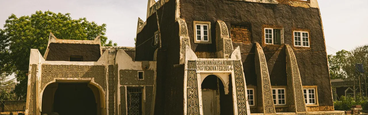 Explore the historical Gidan Dan Hausa in Kano, Nigeria, showcasing traditional architecture.