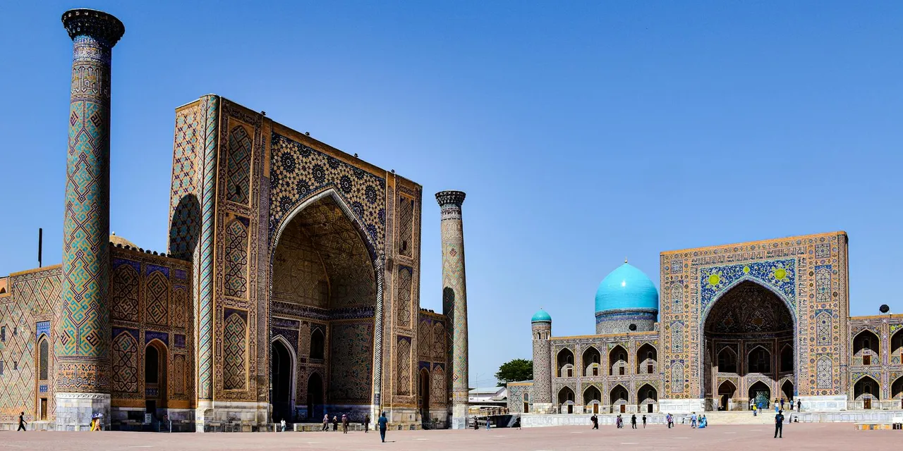 Explore the stunning architecture of Registan Square in Samarkand, Uzbekistan under a clear blue sky.