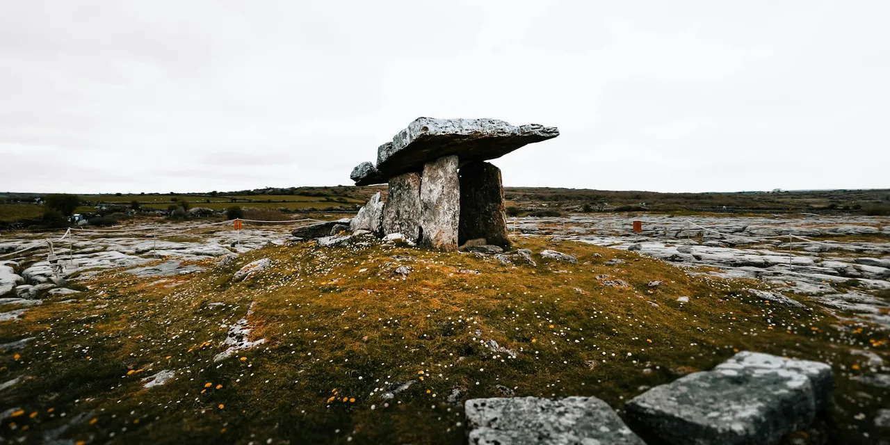 Landscape of Poulnabrone Dolmen in The Burren, a famous megalithic tomb, County Clare, Ireland.