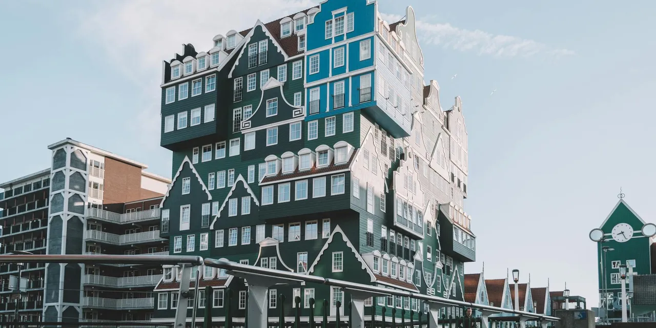 Explore the iconic Inntel Hotel Zaandam with its stunning stacked house design in the Netherlands.