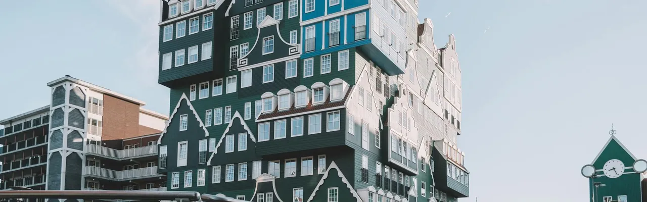 Explore the iconic Inntel Hotel Zaandam with its stunning stacked house design in the Netherlands.