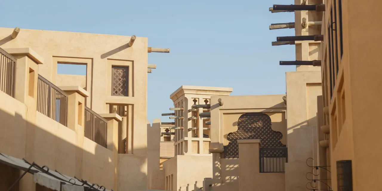 Embrace the blend of traditional and contemporary architectural styles in Dubai, showcasing unique building designs.