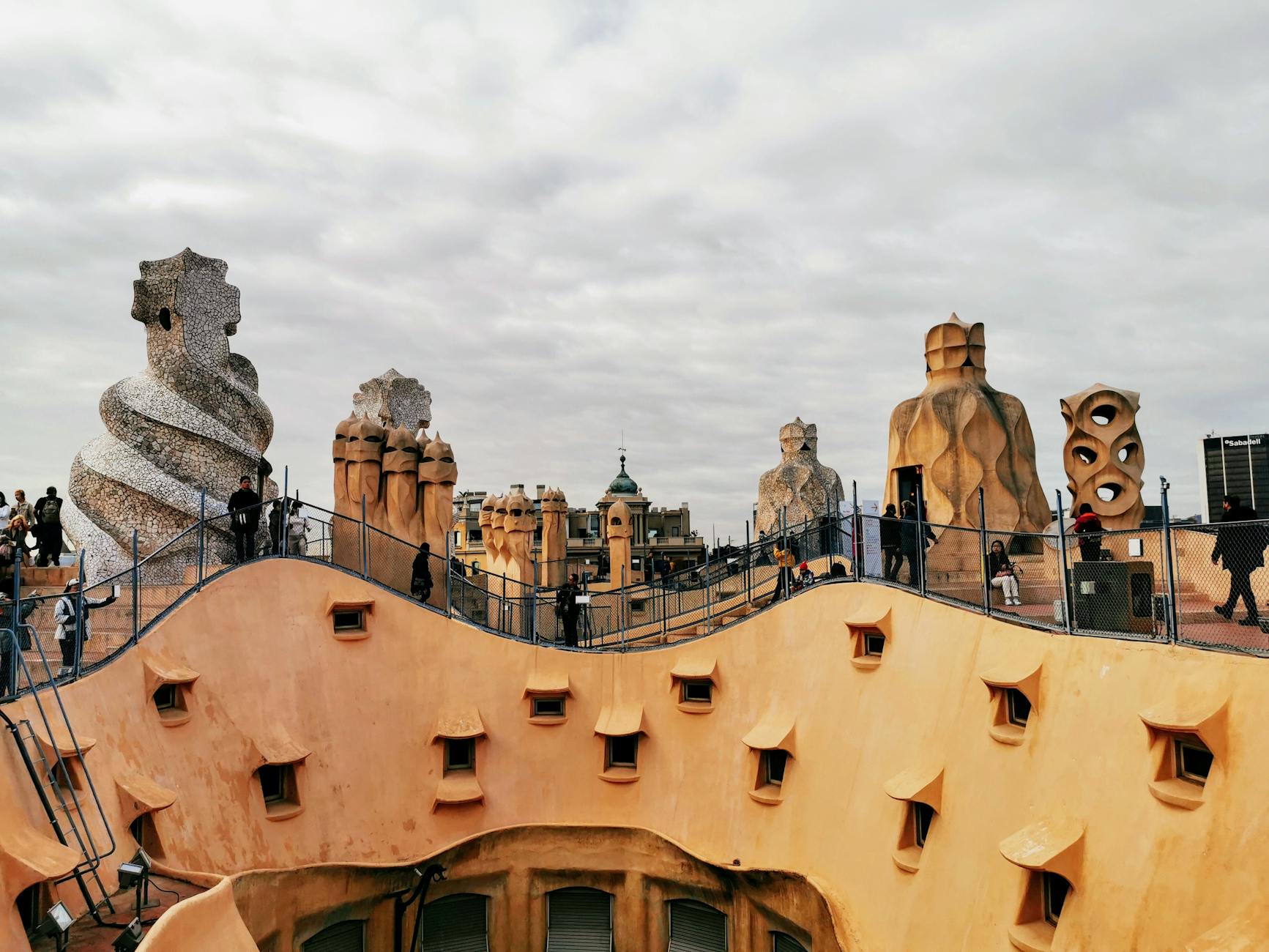 Explore the unique chimneys of Casa Mila rooftop in Barcelona, Spain.