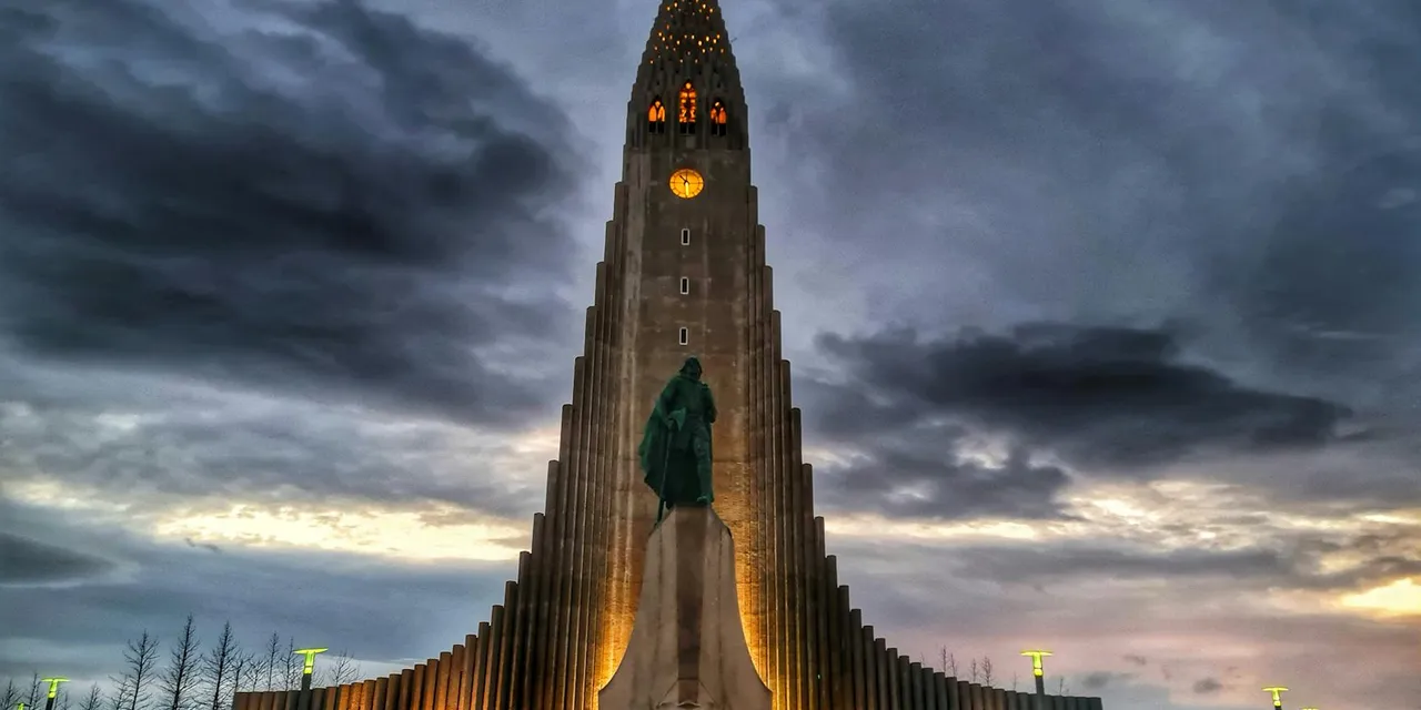 Captivating twilight shot of the iconic Hallgrimskirkja church in Reykjavik, Iceland.