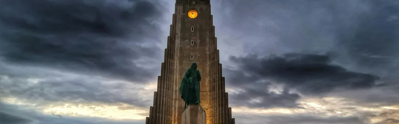 Captivating twilight shot of the iconic Hallgrimskirkja church in Reykjavik, Iceland.