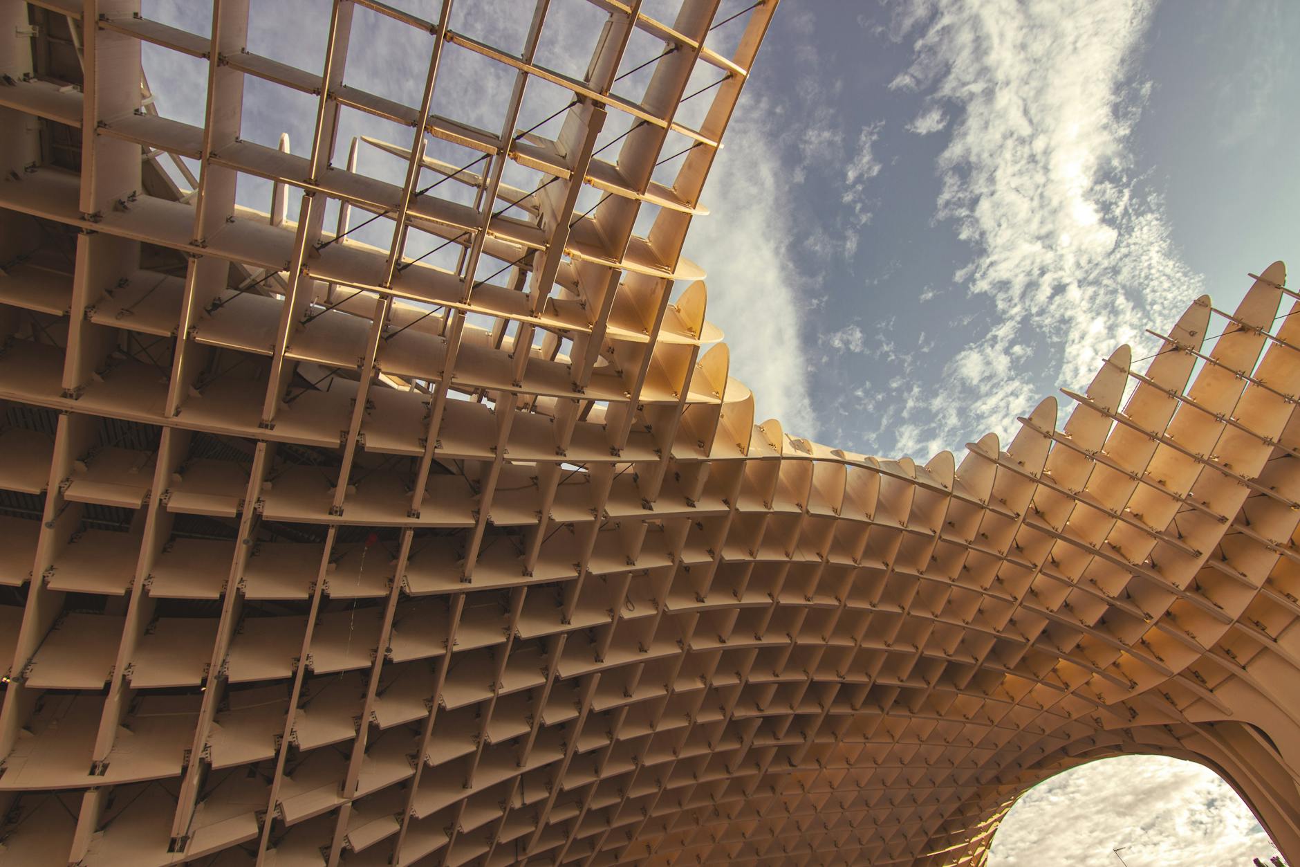 Stunning view of the Metropol Parasol in Seville, showcasing modern architectural design against a blue sky.