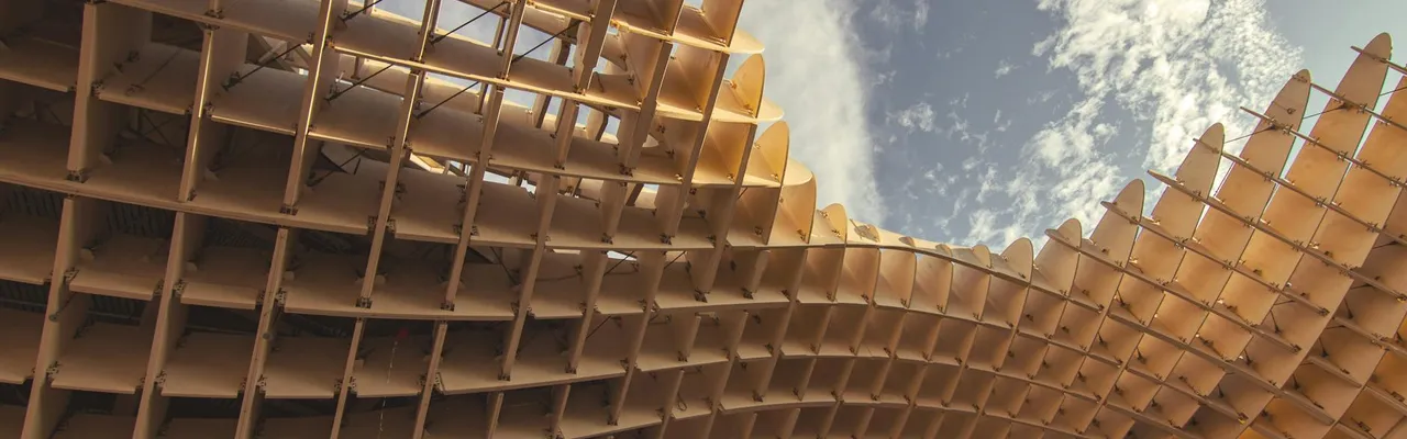 Stunning view of the Metropol Parasol in Seville, showcasing modern architectural design against a blue sky.