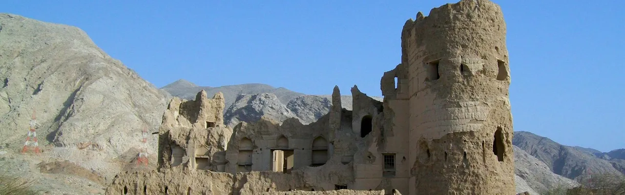 Explore the ancient ruins of a mud brick fort in Muscat, Oman, showcasing history and heritage.