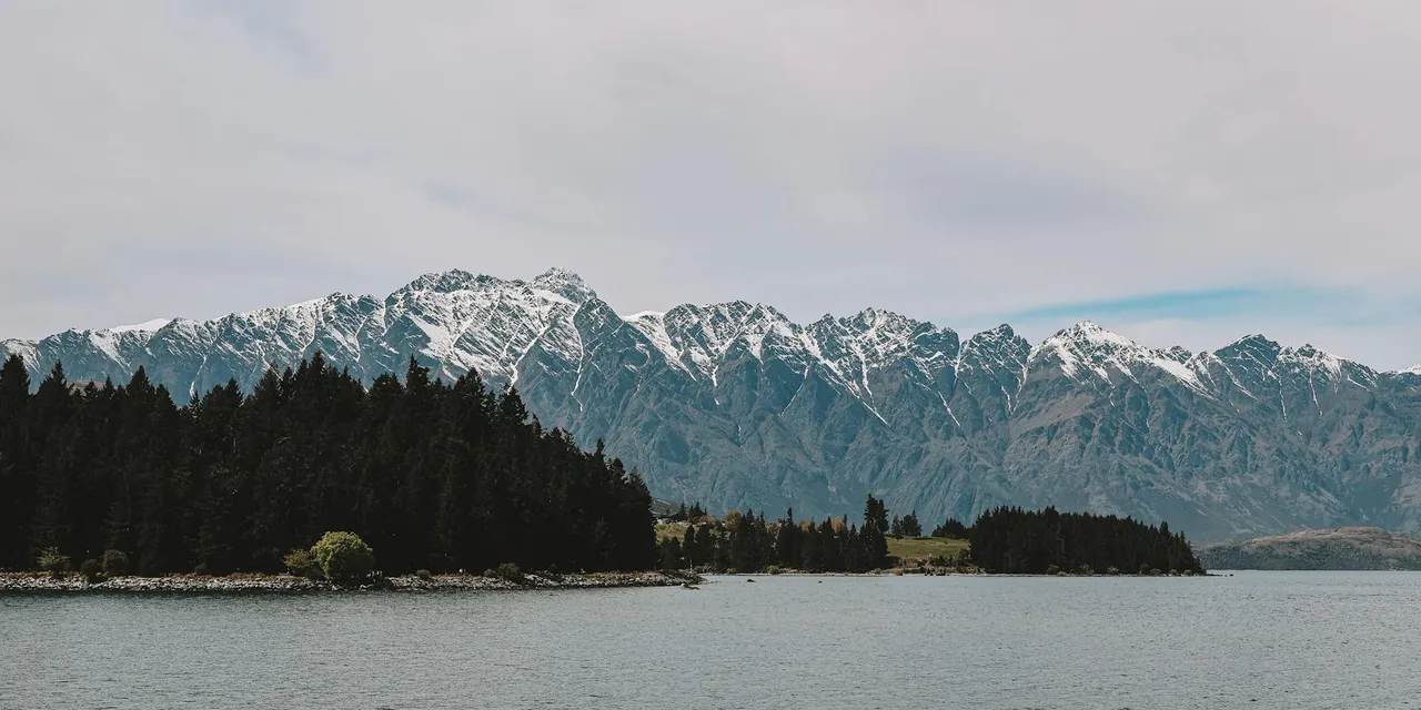Experience the breathtaking scenery of Lake Wakatipu with the Remarkables mountain range in Queenstown, New Zealand.