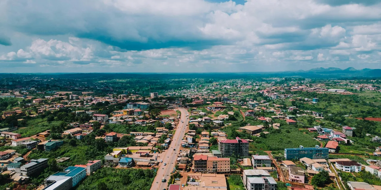 Aerial view of Juba with a wide road stretching through the city, South Sudan
