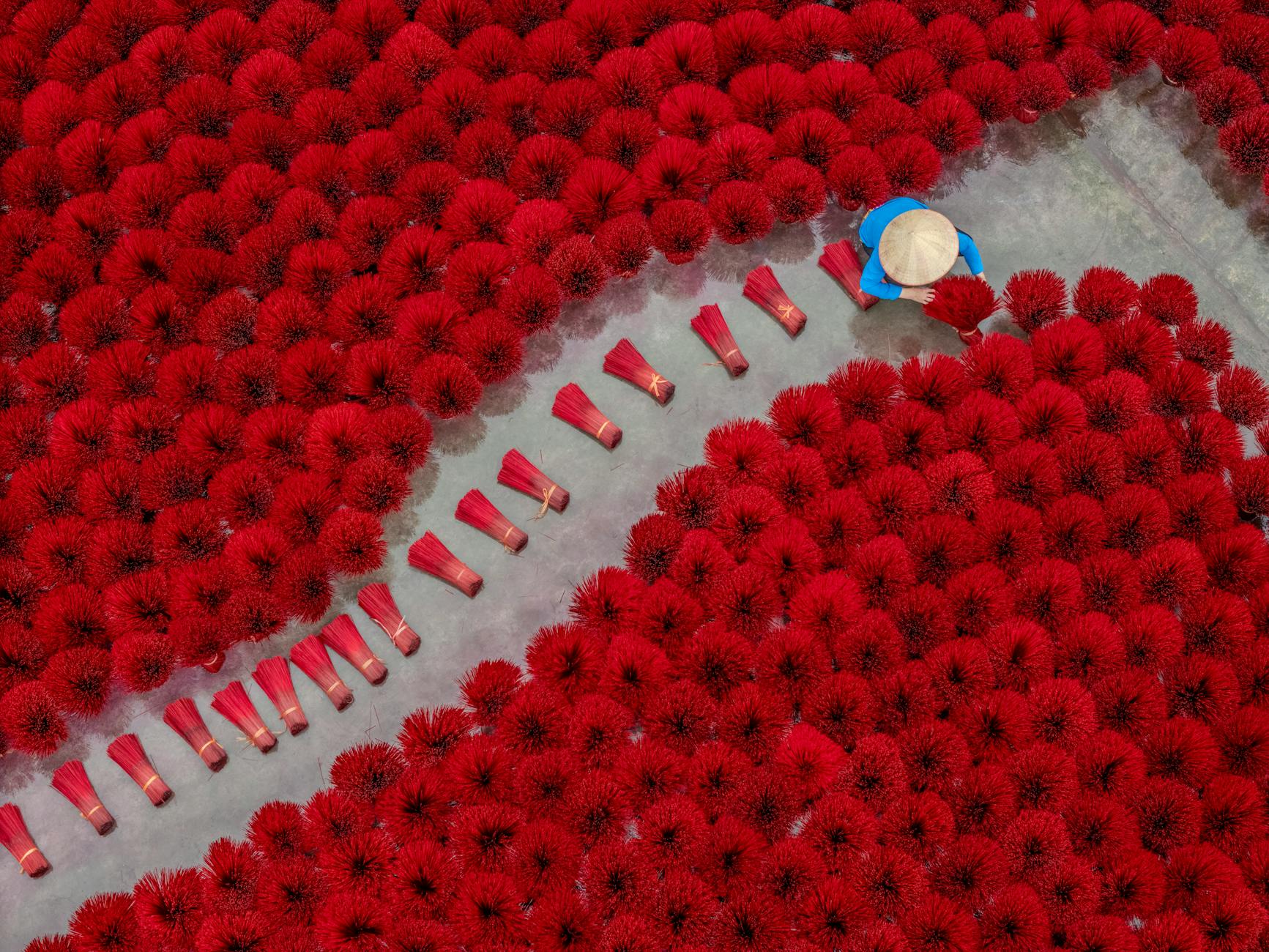 Stunning aerial shot of incense drying in Vietnam with vibrant colors and pattern.