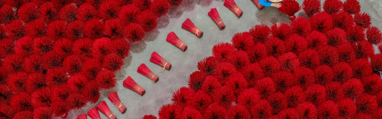 Stunning aerial shot of incense drying in Vietnam with vibrant colors and pattern.