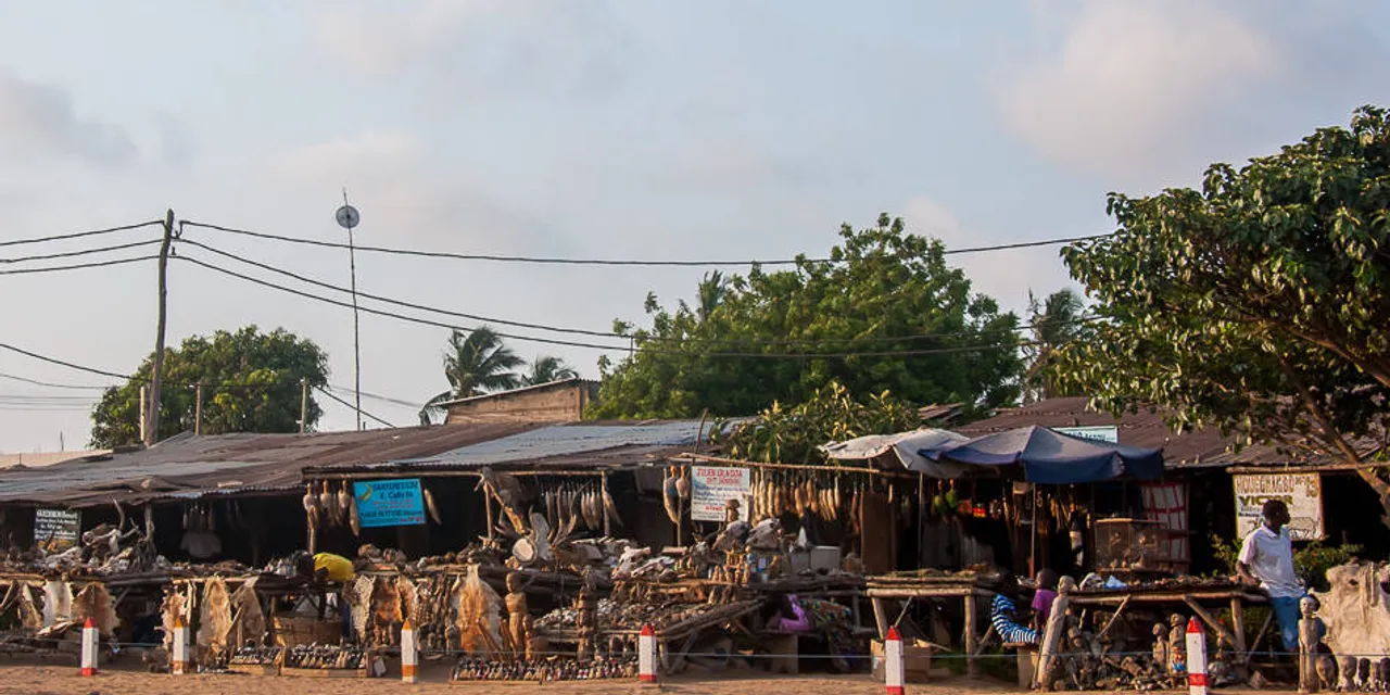Beachside voodoo market stalls with carvings and artefacts, Lomé, Togo