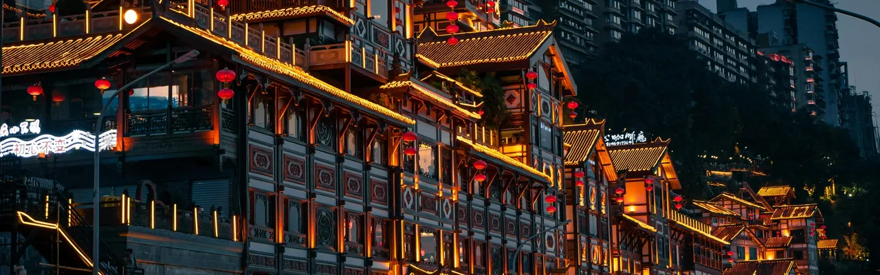 Chongqing night cityscape with glowing red lanterns, China