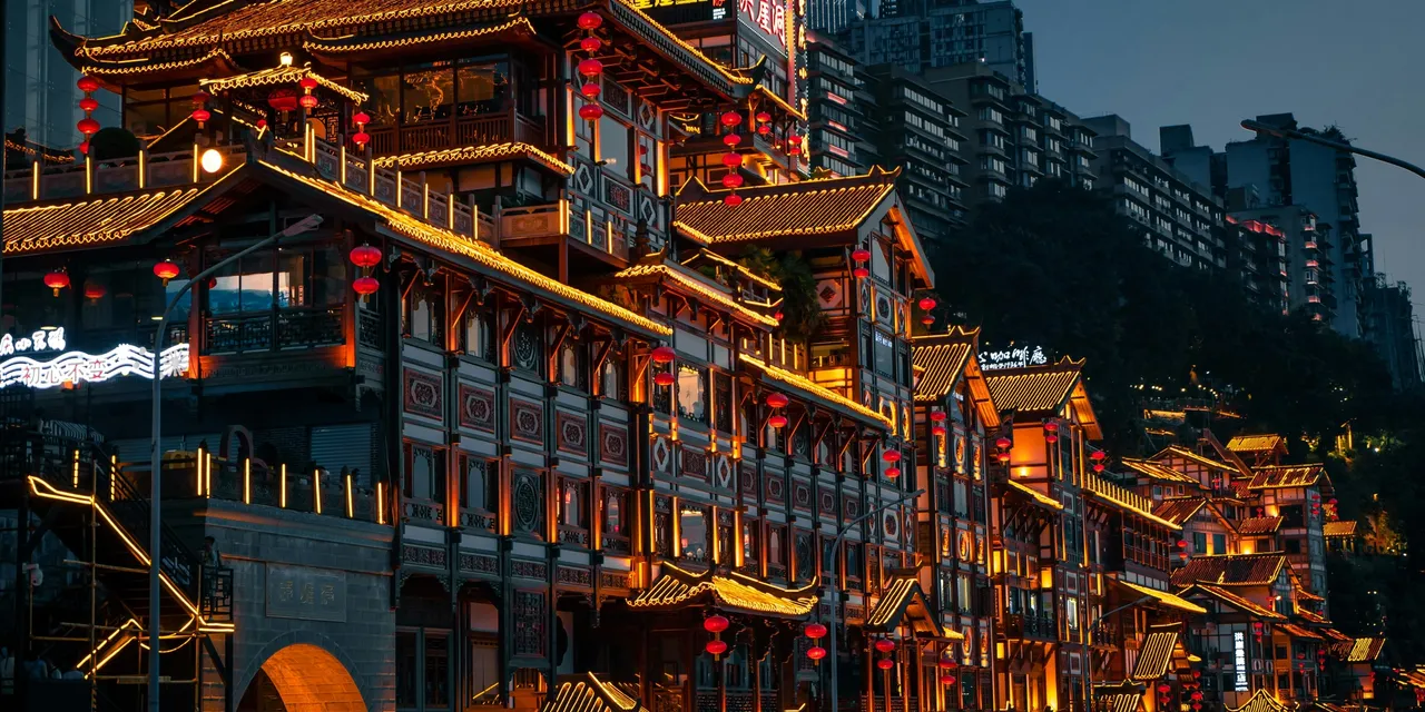 Chongqing night cityscape with glowing red lanterns, China