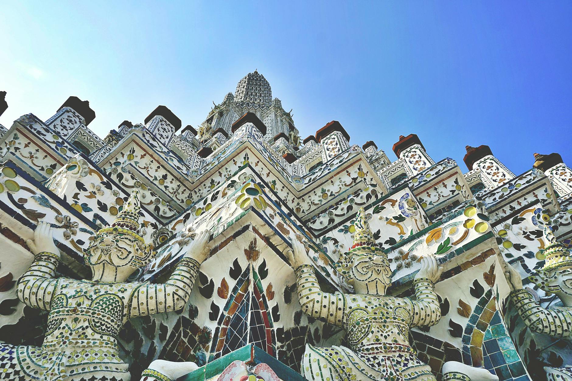Close-up of the intricate mosaics at Wat Arun temple, Bangkok, Thailand.