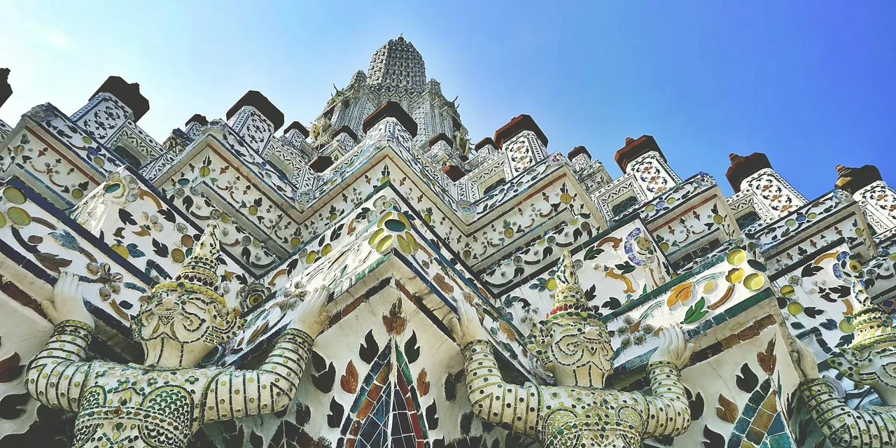 Close-up of the intricate mosaics at Wat Arun temple, Bangkok, Thailand.
