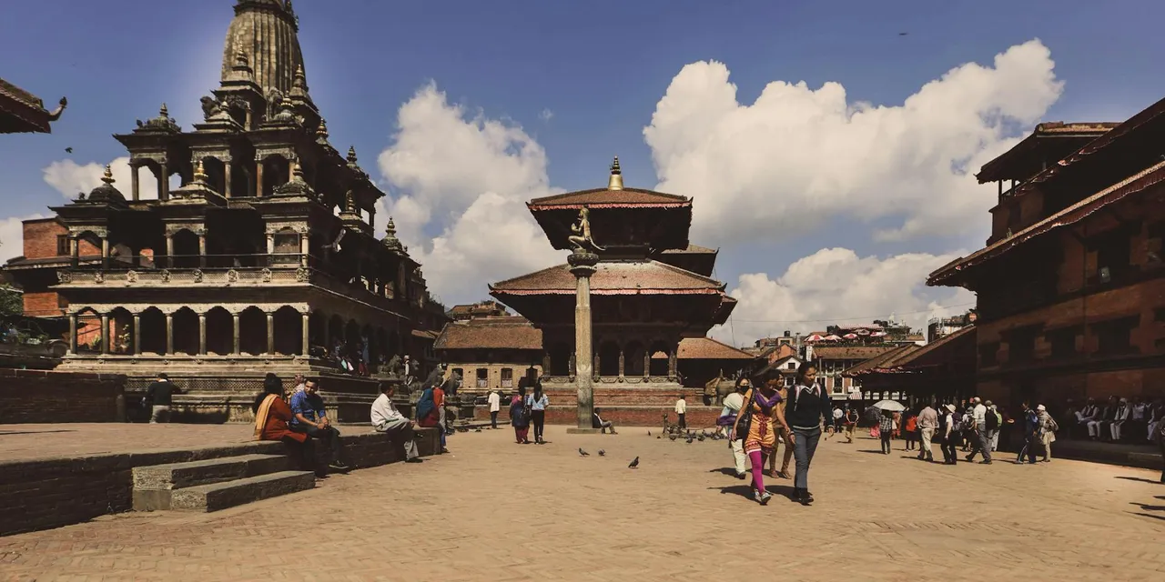 Explore the ancient architecture and vibrant life at Patan Durbar Square in Nepal.