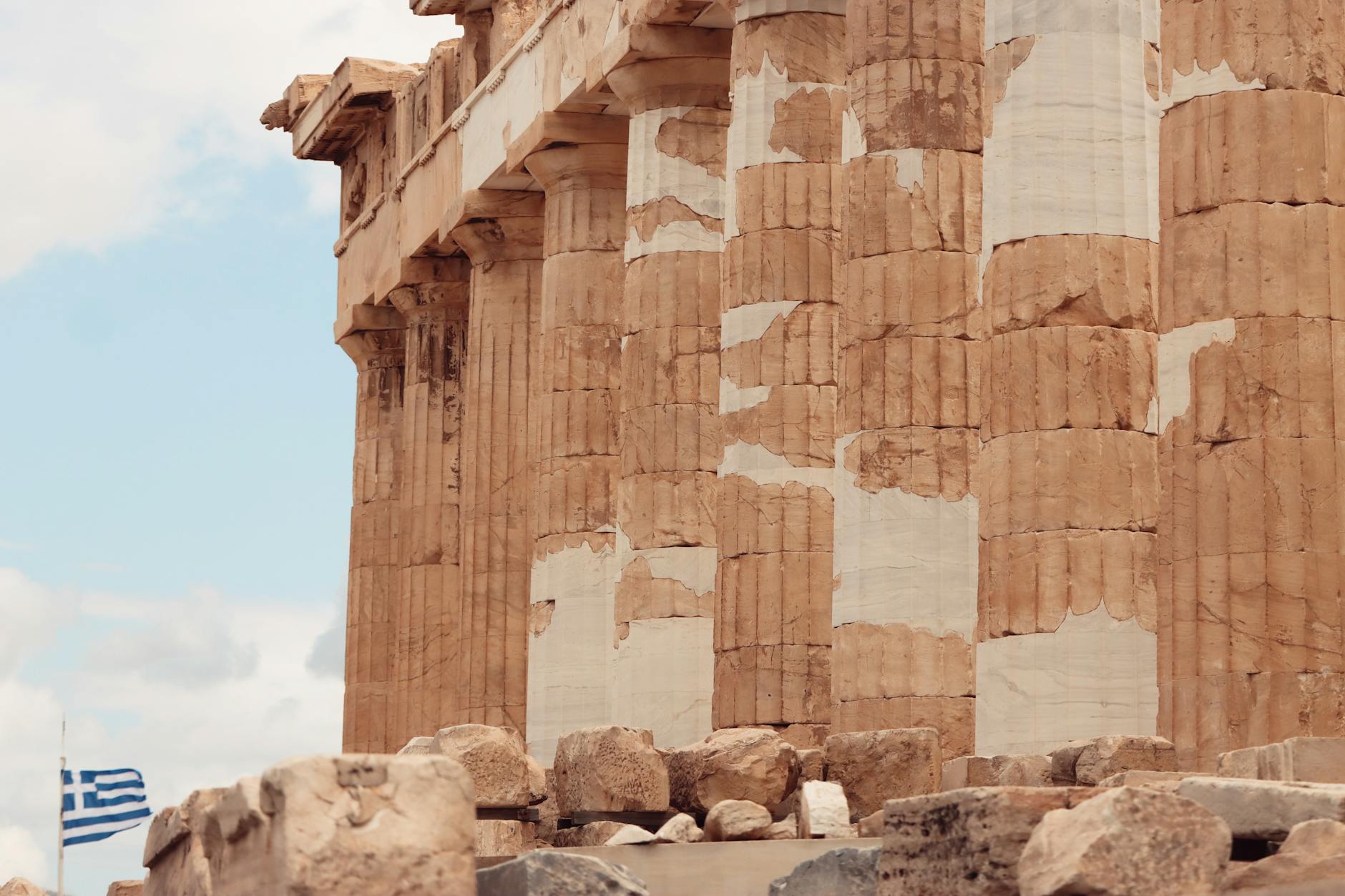 Detailed close-up of the Parthenon's ancient columns in Athens, Greece.