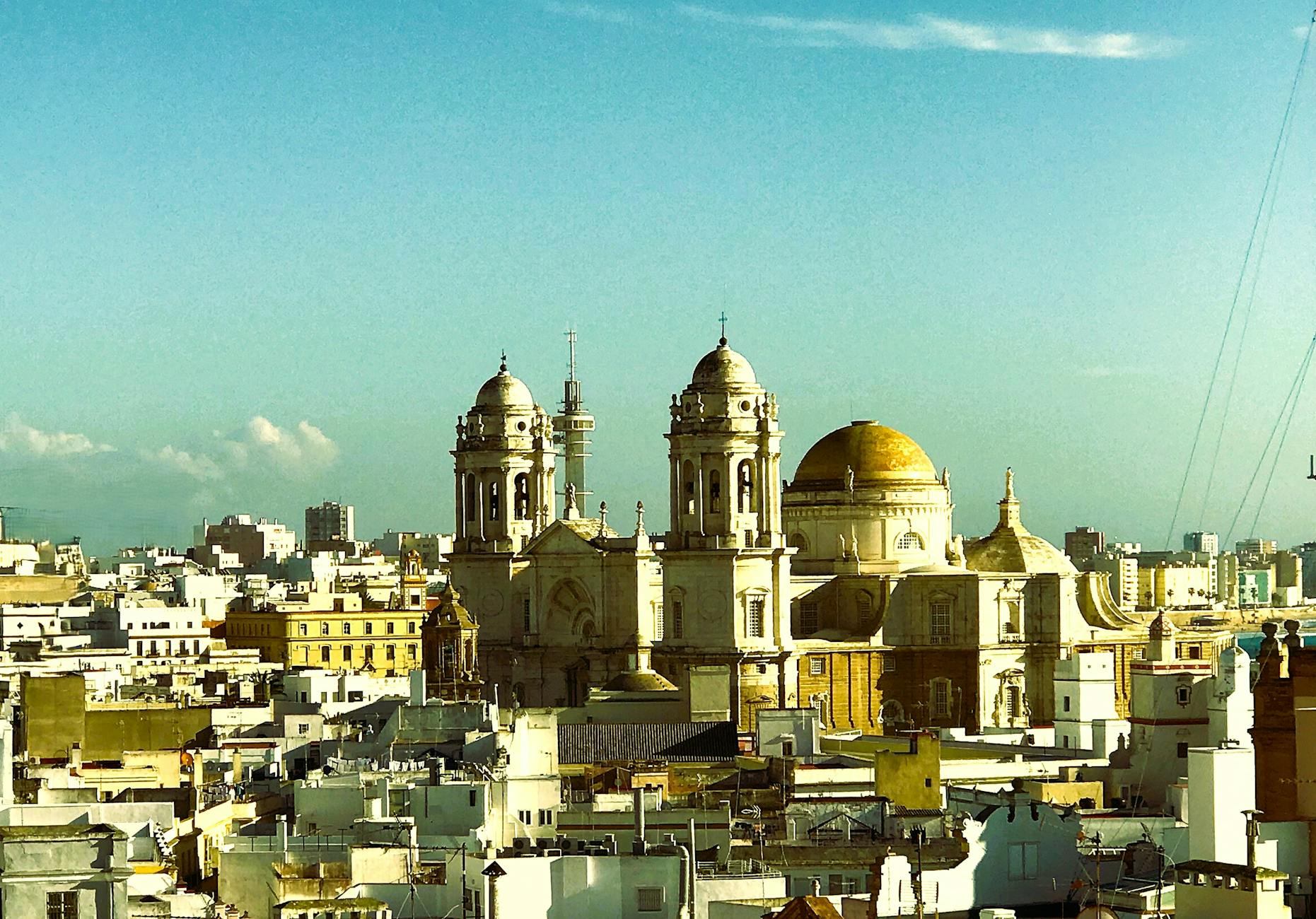Captivating aerial view of Cádiz Cathedral in Andalusia, Spain, showcasing Baroque architecture.