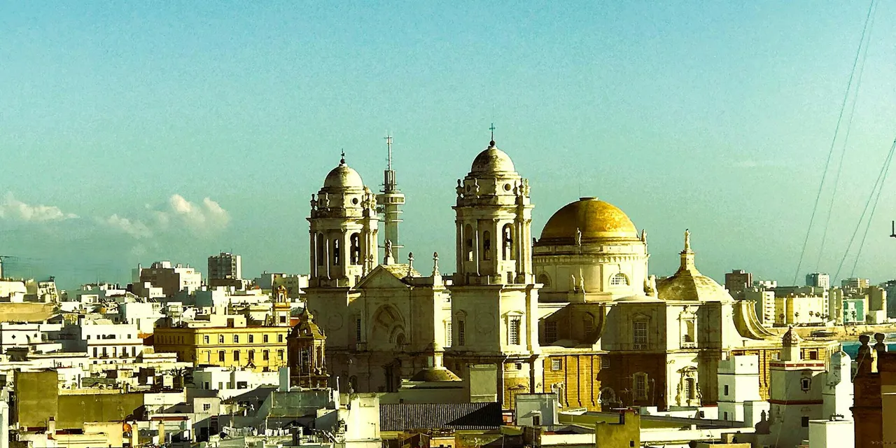 Captivating aerial view of Cádiz Cathedral in Andalusia, Spain, showcasing Baroque architecture.