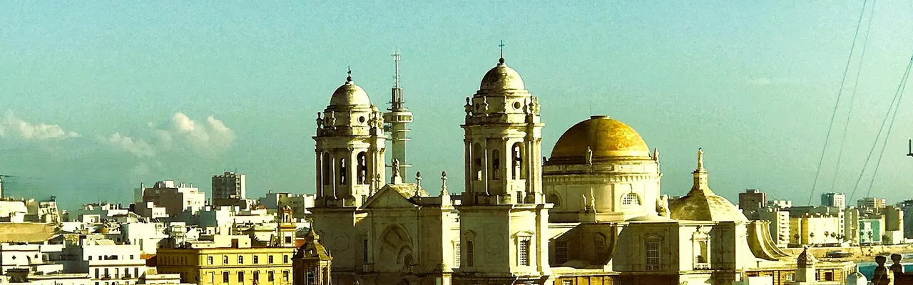 Captivating aerial view of Cádiz Cathedral in Andalusia, Spain, showcasing Baroque architecture.