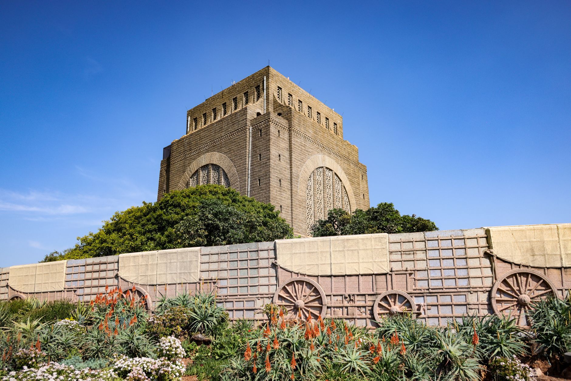 The Voortrekker Monument in Pretoria, a notable historic landmark surrounded by lush gardens.