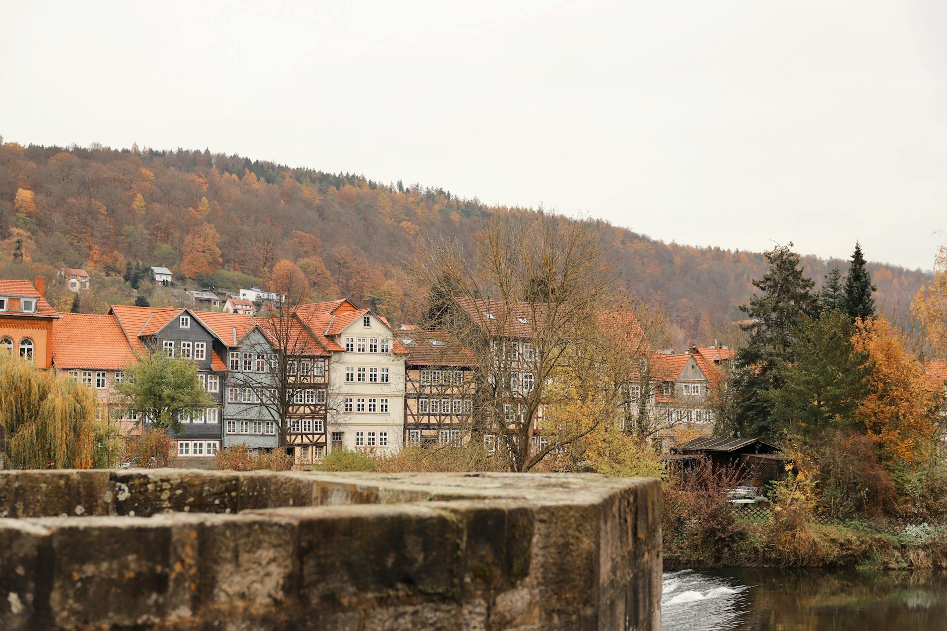 Picturesque autumn scene of historic half-timbered houses in Hann. Münden, Germany.