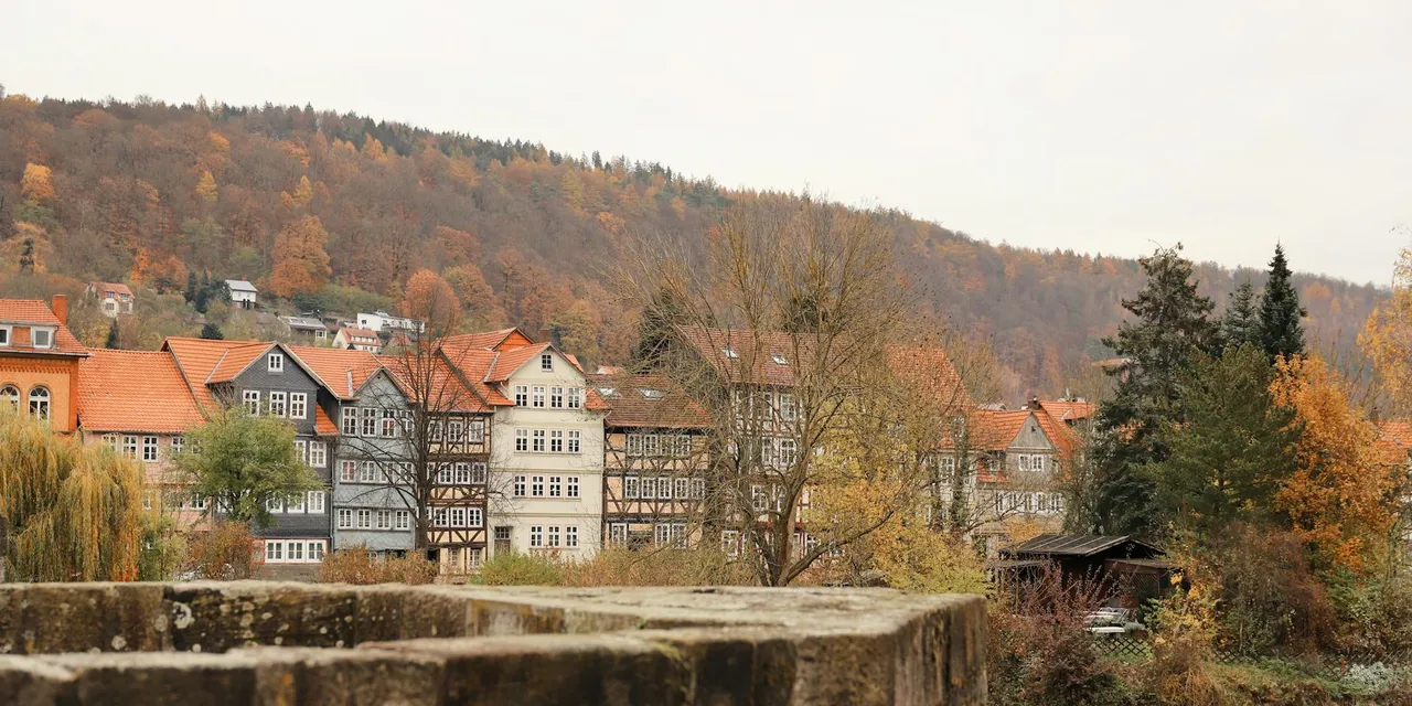 Picturesque autumn scene of historic half-timbered houses in Hann. Münden, Germany.