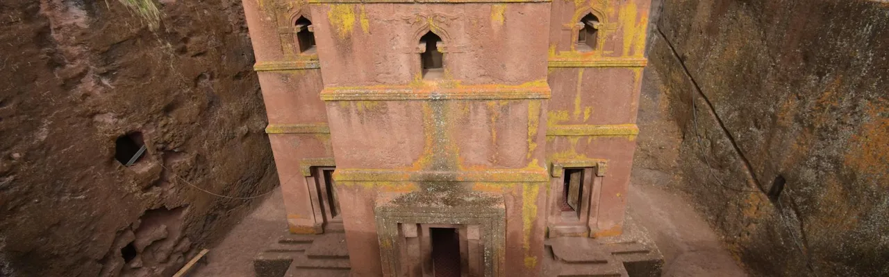 Stunning view of a rock-hewn church in Lalibela, Ethiopia, showcasing its architectural brilliance.
