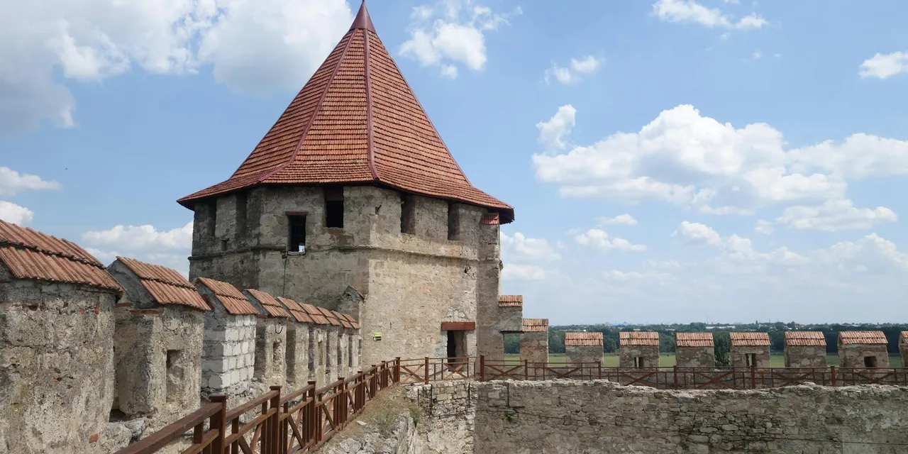 Scenic view of Bendery Fortress, a notable historical site in Bender, Moldova, under a clear blue sky.