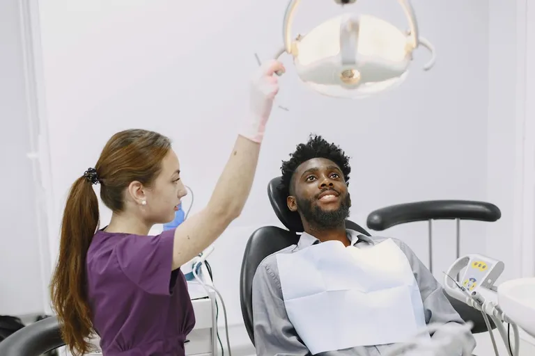 Man in dentist chair in Barcelona, Spain