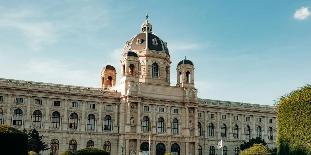 Elegant facade of Kunsthistorisches Museum in Vienna, Austria on a sunny day, iconic architecture.