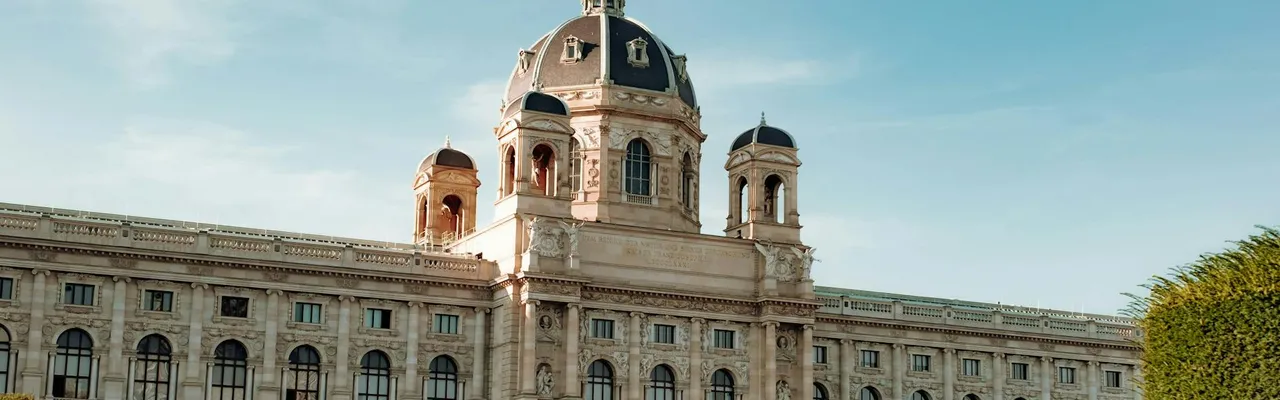Elegant facade of Kunsthistorisches Museum in Vienna, Austria on a sunny day, iconic architecture.