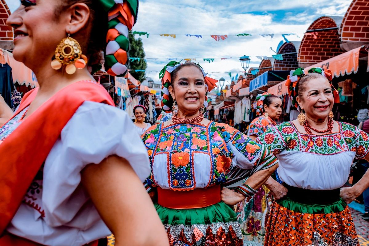Mexican women in traditional dress ADHD busy street