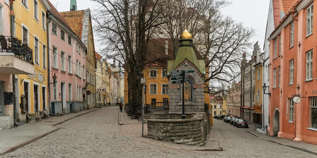 Explore the historic cobblestone streets of Tallinn, Estonia's medieval old town.